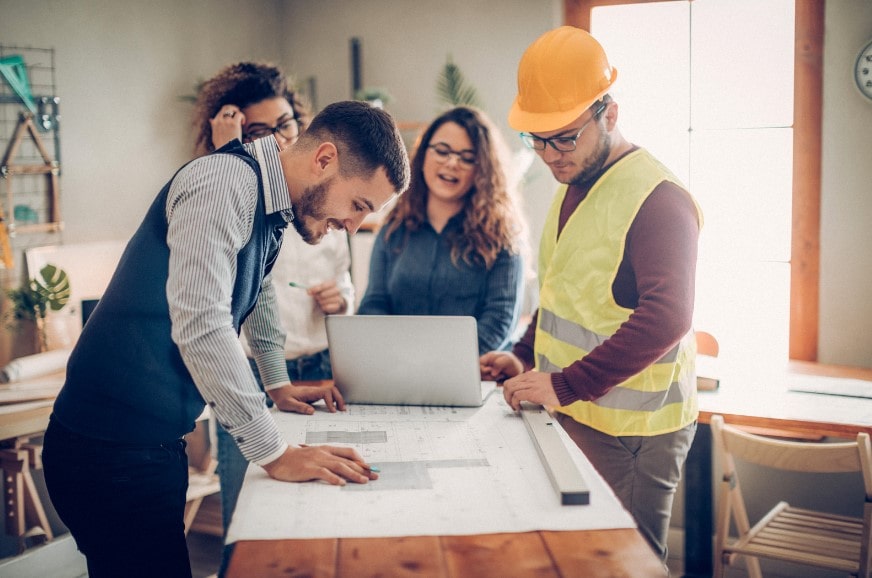 A team participating in a construction consultation using project management software 